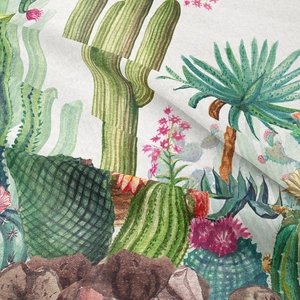 Close-up of bohemian tapestry fabric showing detailed vintage cactus and succulent print