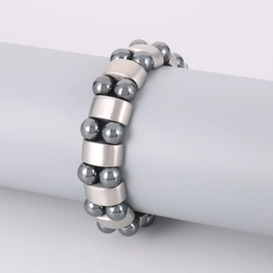 Double-row grey hematite and stainless steel beads elastic bracelet for men on display