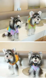 Detail of color-block fleece pet vests with leash ring for small dogs in vibrant tones