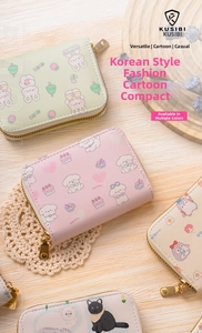 Close-up of cute cartoon accordion card holders in pastel colors on a rustic wooden table