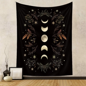 Close-up of black moon phase tapestry featuring winter botanicals and snowflakes
