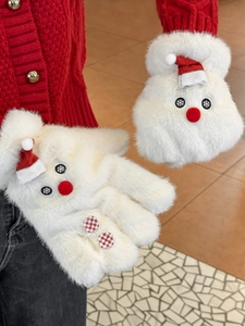 Detailed view of white plush snowman mittens featuring a red hat and decorative buttons
