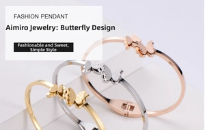 Detailed view of three butterfly bangles in gold, silver, and rose gold polished finishes