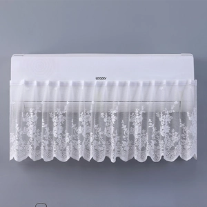Elegant white lace air conditioner cover with floral patterns for dust protection