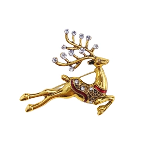 Elegant gold reindeer brooch with sparkling crystals and red enamel for Christmas fashion