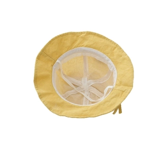 Yellow toddler bucket hat with breathable mesh lining and windproof drawstring straps