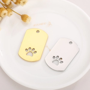 Polished rectangular stainless steel pet tags with hollow paw print in gold and silver