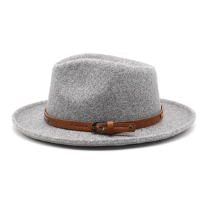 Detail of gray wool felt Fedora hat with brown leather band and metallic buckle