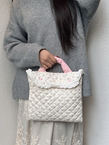 Quilted floral laptop sleeve with pink handles and lace trim for 11 inch notebook