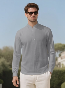 Detail of grey men's linen shirt showing the mandarin collar and natural fabric texture
