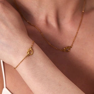 Parure de collier et bracelet à nœud coeur en acier inoxydable doré brillant pour femme