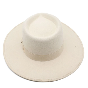 Detail of elegant beige wool fedora featuring a wide brim and matching grosgrain ribbon