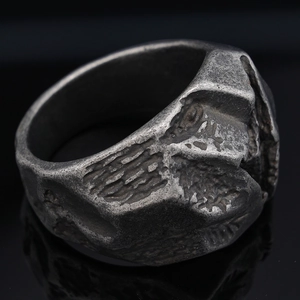 Retro distressed stainless steel ring with rustic stone-like texture and gothic aesthetic