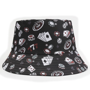 Detail shot of black bucket hat with casino prints including poker chips and roulette