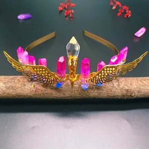 Detailed shot of handmade gold wings bridal headband with colorful raw crystal stones
