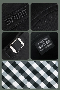 Detail view of cotton flat top cap with SPIRIT embroidery, metal buckle and plaid lining