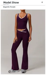 Detail of high-waisted yoga set with contrast piping and cross-waist design in dark purple
