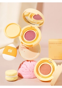 Creative display of Xixi cushion blush floating with pink and peach makeup shades