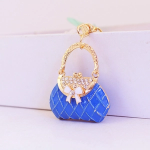 Blue rhinestone bow handbag keychain pendant crafted with metal and enamel finish