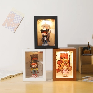 Illuminated 3D shadow box display cases with LED lights and miniature figures in wood frames