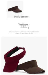 Detail view of coffee and burgundy sun visors with adjustable straps and wide brims