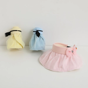 Detail view of foldable sun hats for girls with mesh brims and bow decorations