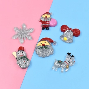 Glittery Christmas resin charms set featuring Santa, snowman, snowflake and reindeer details