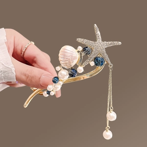 Pince à cheveux marine avec étoile de mer en strass coquillage rose et glands de perles