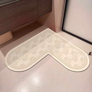 L-shaped beige absorbent bath mat with floral pattern for bathroom corner use
