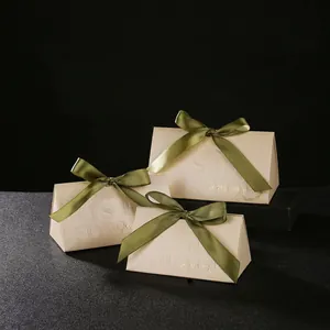 Champagne triangular wedding favors box with wooden ring handle and green ribbon