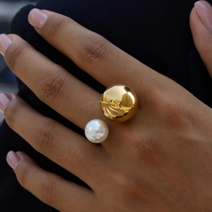 18K gold-plated stainless steel open ring featuring a large metal ball and a white pearl