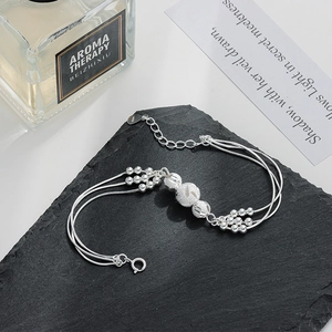 Minimalist S925 sterling silver multi-layered bracelet with engraved beads on black stone
