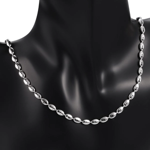 Polished silver stainless steel coffee bean link necklace on professional black mannequin