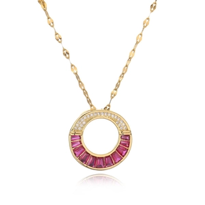 Gold plated copper necklace featuring teardrop pendant with red gemstones and zircons
