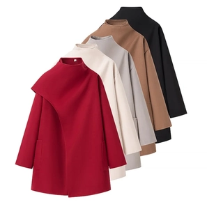 Detail of wool blend coats showing texture and color options in red, beige and grey