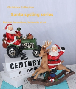 Santa Claus riding a reindeer rocker and driving a green tractor resin ornaments