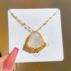 Titanium steel gold necklace featuring a jade Buddha pendant with sparkling zircon accents