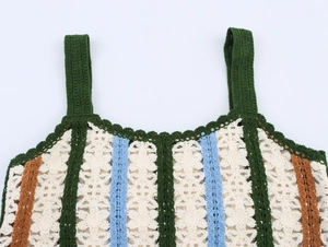Close-up of bohemian crochet knit camisole showing green stripes and texture