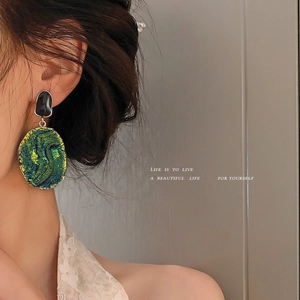 Vintage art style green resin drop earrings with geometric gold metal for women