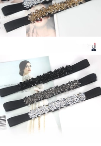 Detail of elegant elastic waist belt with floral crystal rhinestones for dresses