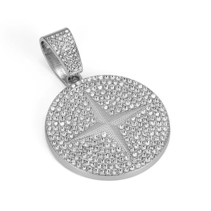 Macro shot of silver hip hop round pendant with iced out rhinestones and star pattern