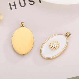 Fashionable gold oval necklace pendants with white enamel and sunburst pearl inlay