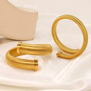 Minimalist gold titanium steel cuff bracelets with vertical spring spiral texture