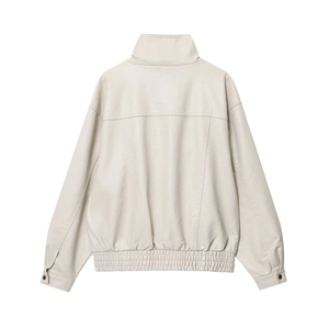 Detail view showing the smooth faux leather texture and back seam of the cream PU jacket