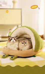 Pea-shaped warm plush pet bed in avocado green for two cats to sleep comfortably