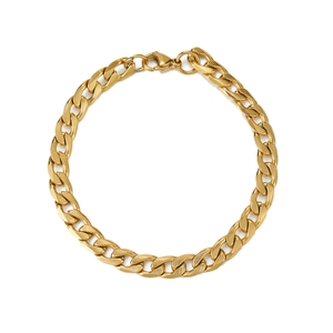 Macro shot of gold Cuban chain necklace with high-polish finish and lobster clasp