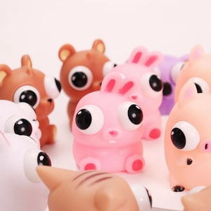 Group of cute animal squeeze toys with popping eyes feature on a white background