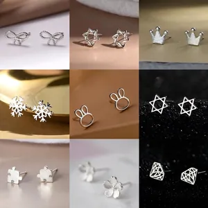 Collection of nine minimalist S925 sterling silver stud earrings in various geometric shapes