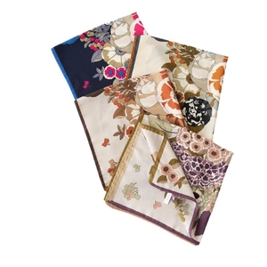 Three vintage floral print silk scarves with geometric patterns on a white background