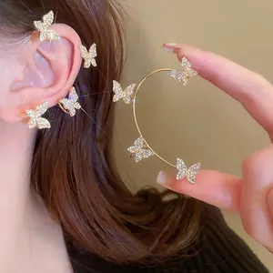 Elegant gold butterfly ear cuff with sparkling rhinestones for non-pierced ears